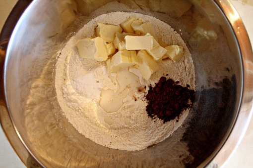 grated-cheesecake-flour-mixture-and-butter-egg-zest-sugar