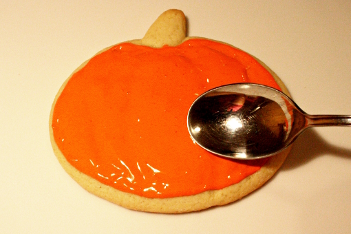 halloween-pumpkin-sugar-cookies-decorating-first-layer-spread