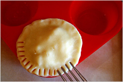 mini apple pies recipe with step by step pictures, ingredients, Thanksgiving pies, Thanksgiving recipe, Holiday recipes, put dough circle on top of mini pie, with your finger, press the edges gently, using a fork, create some nice ornament