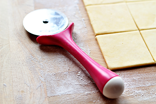 Christmas Bowtie Cookies recipe with step by step pictures, cutting dough with pizza cutter