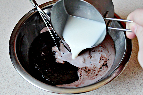 Chocolate Cake With Chocolate Buttercream Frosting, in a separate bowl, dissolve the cocoa in the boiling water, then add the milk