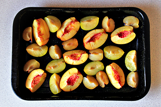 roasted summer fruit with rosemary and cream recipe with step by step pictures, scatter all your fruit in a roasting pan