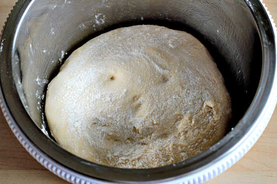 sweet jam filled buns yeasty dough rising in a bowl