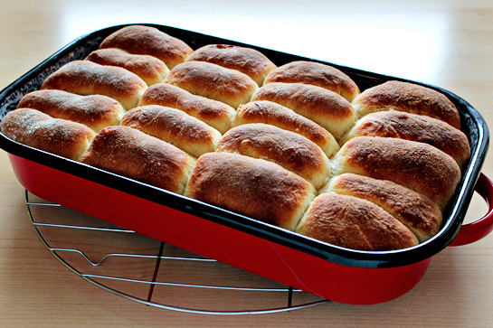 sweet jam filled buns in a baking pan