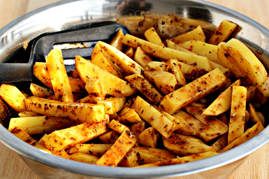 man-approved-spicy-oven-baked-french-fries-sprinkle-the-spices-over-the-potatoes-and-toss-well-to-coat