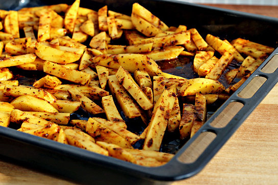 man approved spicy oven baked french fries spray or brush a baking sheet with vegetable oil generously Then place the wedges on the baking sheet