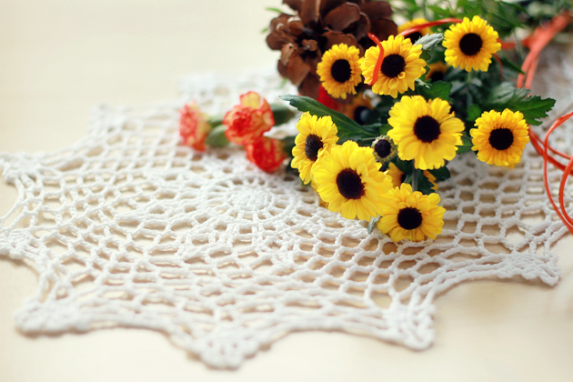 flowers on crochet doily