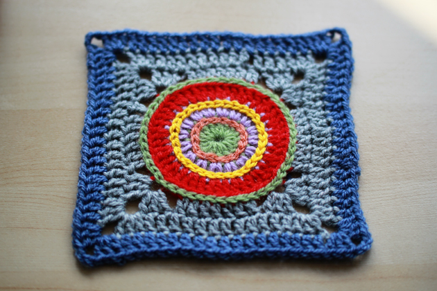 granny square with colorful circle in the middle