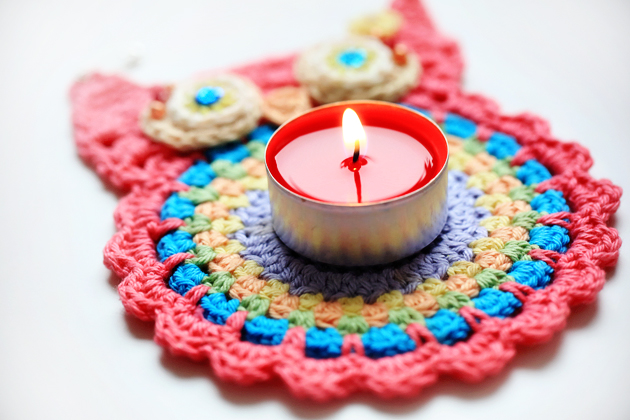 crochet owl coaster and red candle